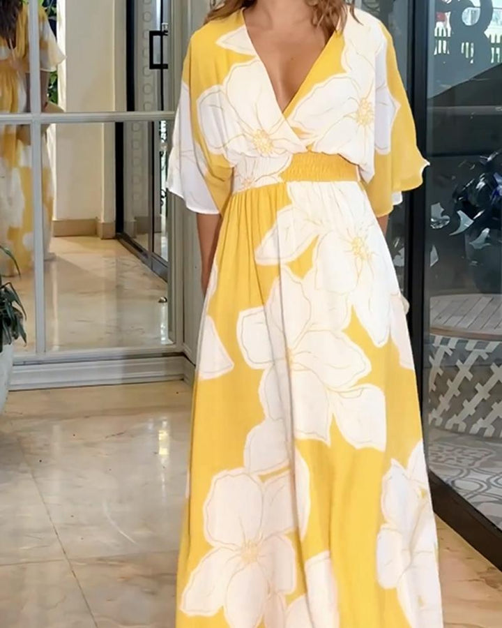 Vestido de mujer Calypso: elegante vestido florido con detalles contrastantes y corte femenino