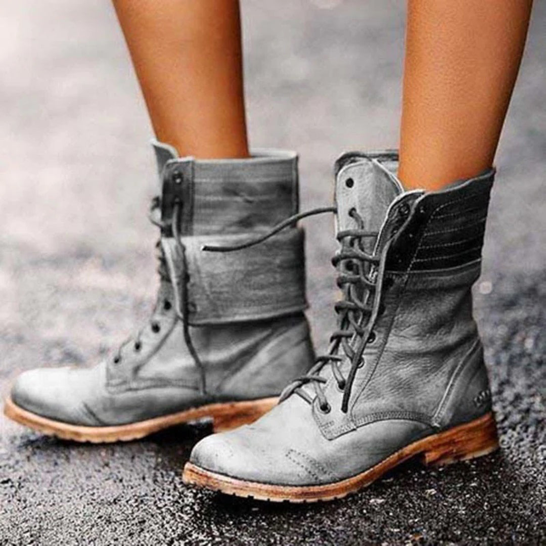 Botines Ambre para mujer: elegantes y cómodos botines de piel con cordones y estilo moderno.